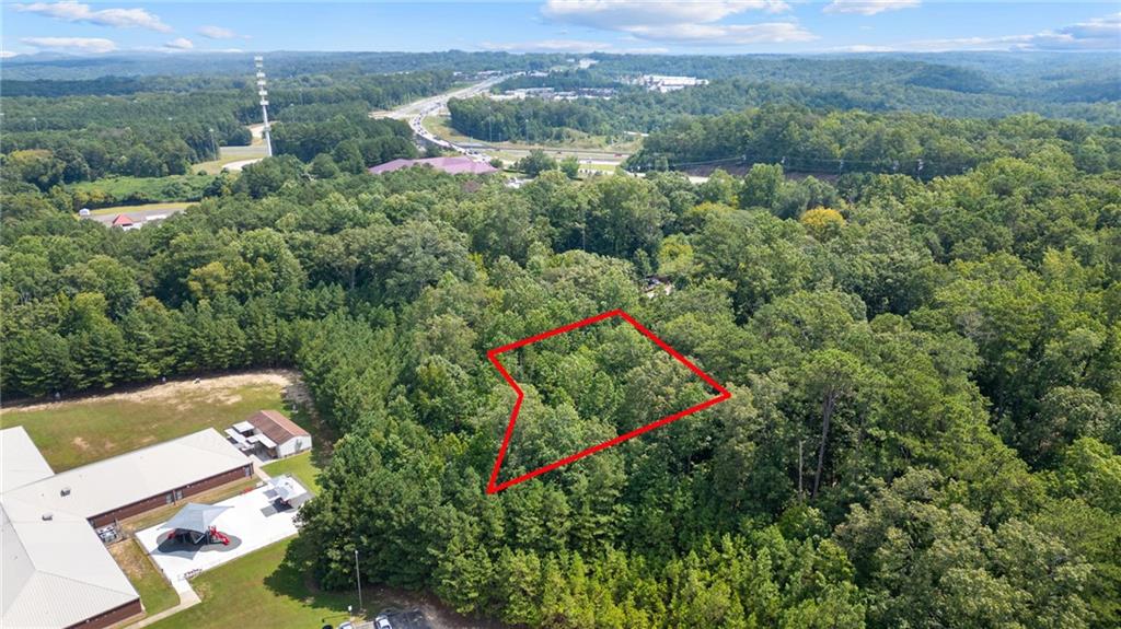 0 Reed Street Canton, GA 30114 - Photo 7 of 13 an aerial view of a house with a yard and lake view