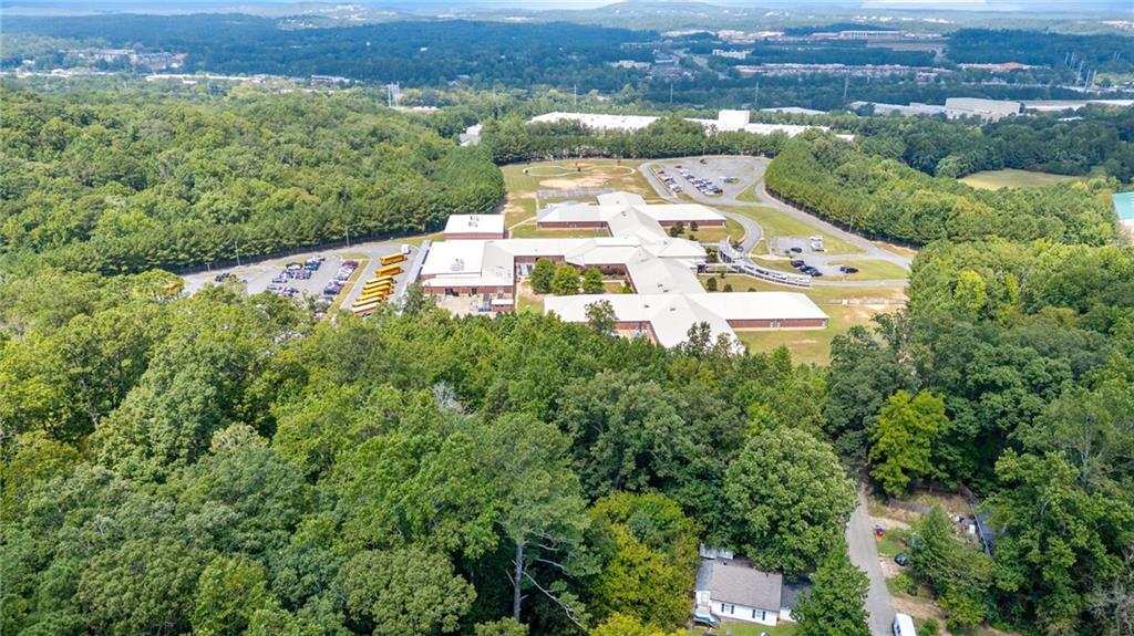 0 Reed Street Canton, GA 30114 - Photo 10 of 13 an aerial view of a house with a yard and lake view