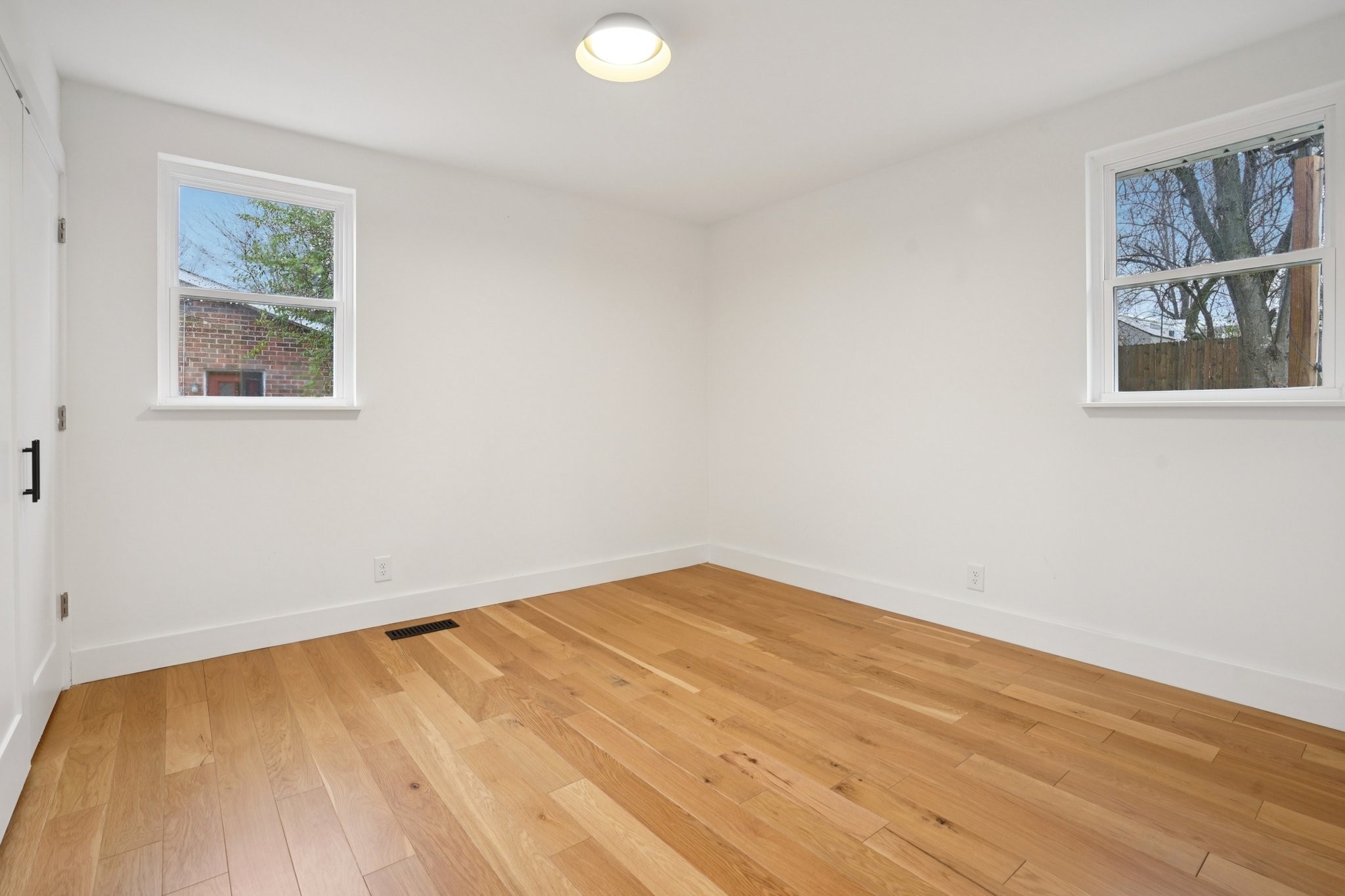 1315 Robin Hill Road Franklin, TN 37064 - Photo 15 of 25 a view of empty room with wooden floor and fan