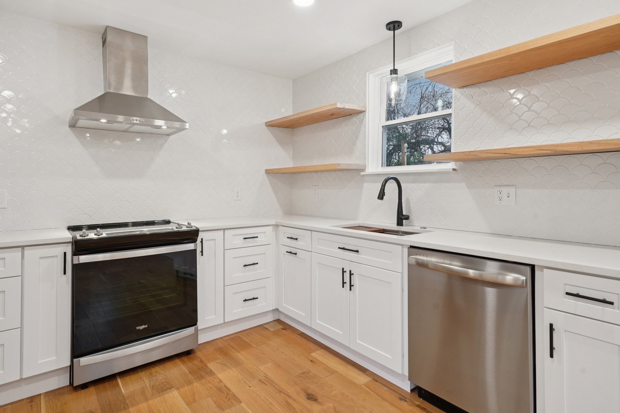 1315 Robin Hill Road Franklin, TN 37064 - Photo 7 of 25 a kitchen with a sink stainless steel appliances and cabinets