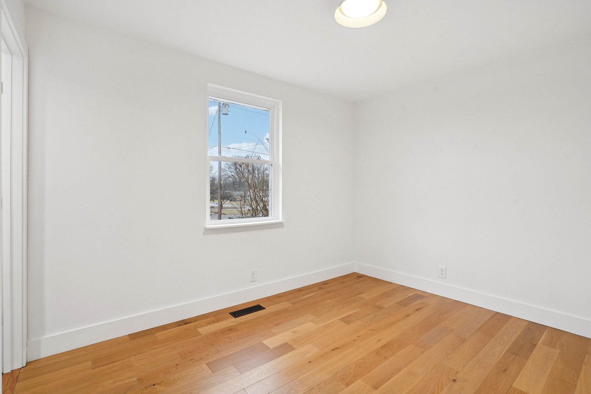 1315 Robin Hill Road Franklin, TN 37064 - Photo 10 of 25 a view of empty room with wooden floor