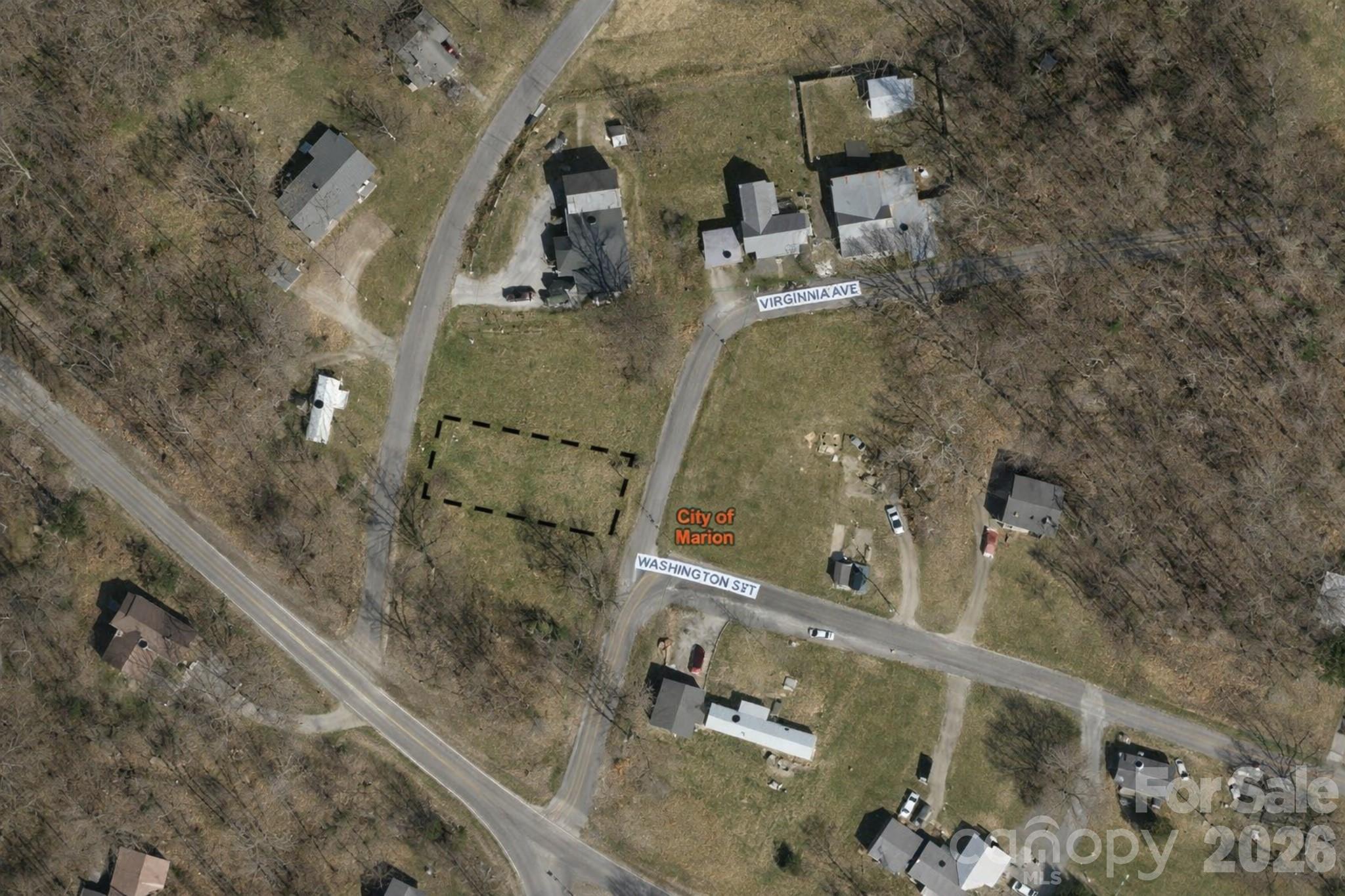 24 Alabama Avenue, Unit 2 Marion, NC 28752 - Photo 3 of 3 an aerial view of residential houses with outdoor space