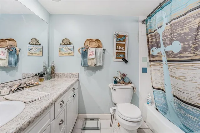 a view of a balcony with furniture