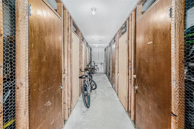 a view of storage and utility room with washer and dryer