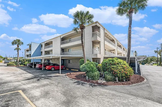 a view of a cars park in front of house