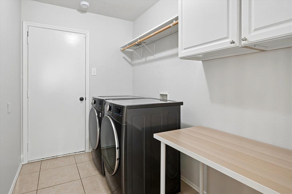 13837 High Mesa Road Fort Worth, TX 76262 - Photo 22 of 25 a utility room with dryer and washer