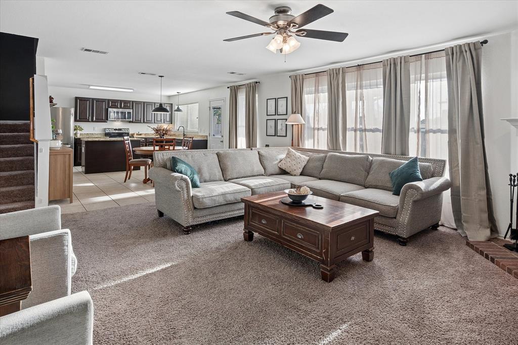 13837 High Mesa Road Fort Worth, TX 76262 - Photo 5 of 25 a living room with furniture and a large window