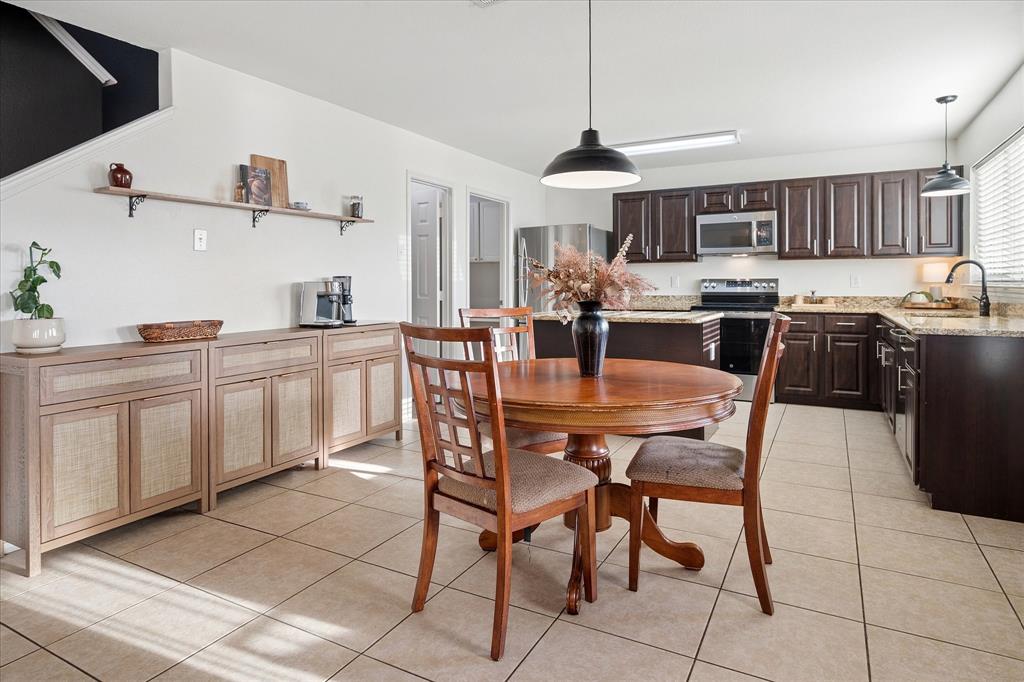 13837 High Mesa Road Fort Worth, TX 76262 - Photo 8 of 25 a view of a dining room with furniture