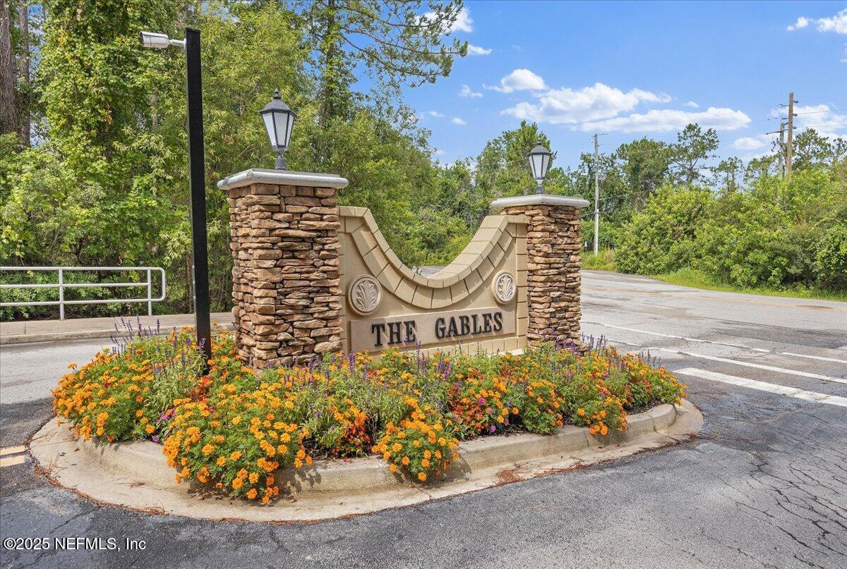 446 Scrub Jay Drive St. Augustine, FL 32092 - Photo 18 of 20 a view of a fountain in the middle of the house