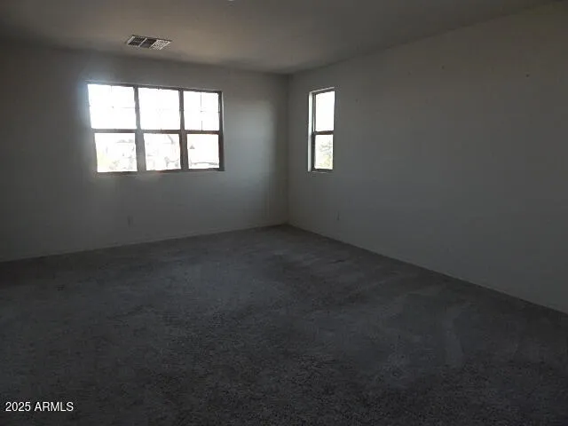 an empty room that has a window