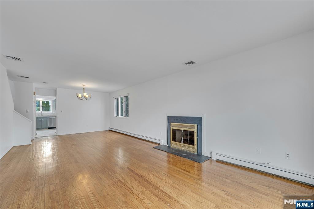2410 3rd Street Fort Lee, NJ 07024 - Photo 3 of 37 a view of a livingroom with wooden floor