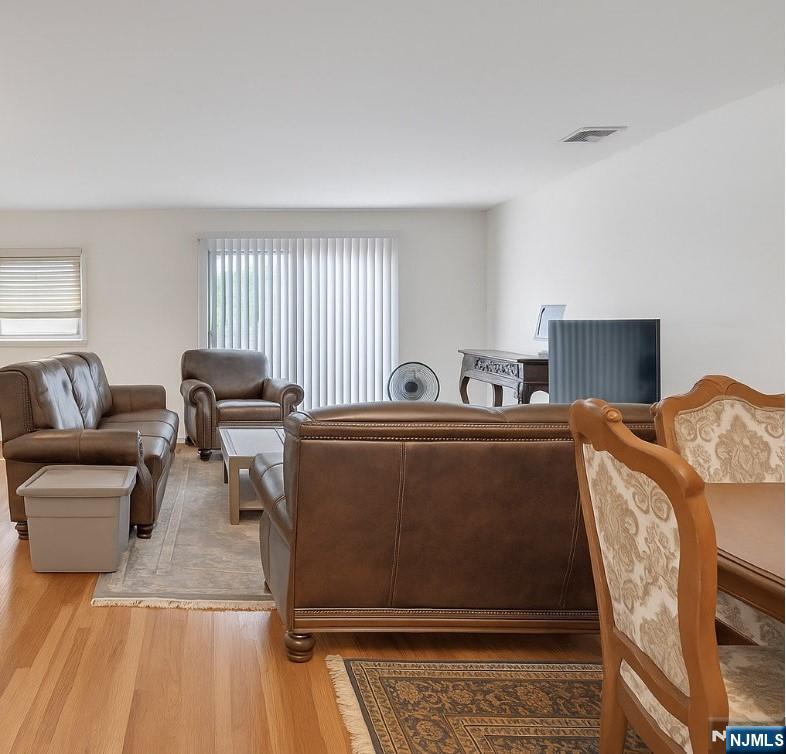 2410 3rd Street Fort Lee, NJ 07024 - Photo 31 of 37 a living room with furniture and a couch