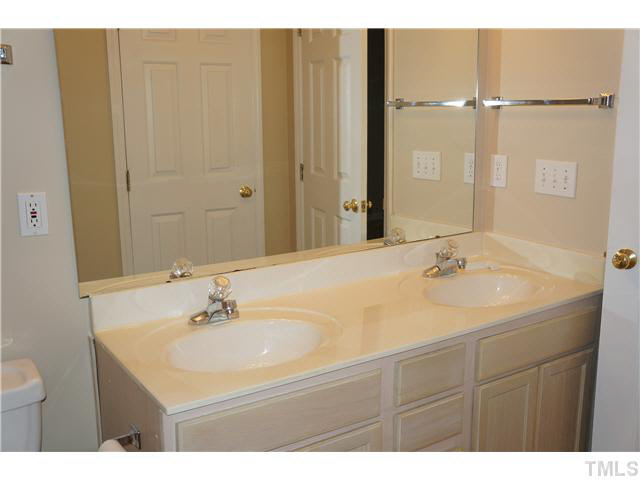 3817 Axle Lane Raleigh, NC 27616 - Photo 14 of 18 Second bathroom also with double sinks.