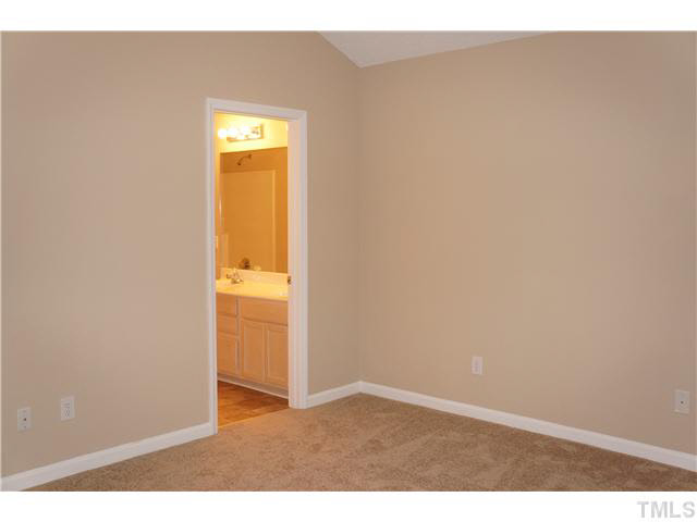 3817 Axle Lane Raleigh, NC 27616 - Photo 10 of 18 Good-sized master bedroom. Bathroom with double sinks.