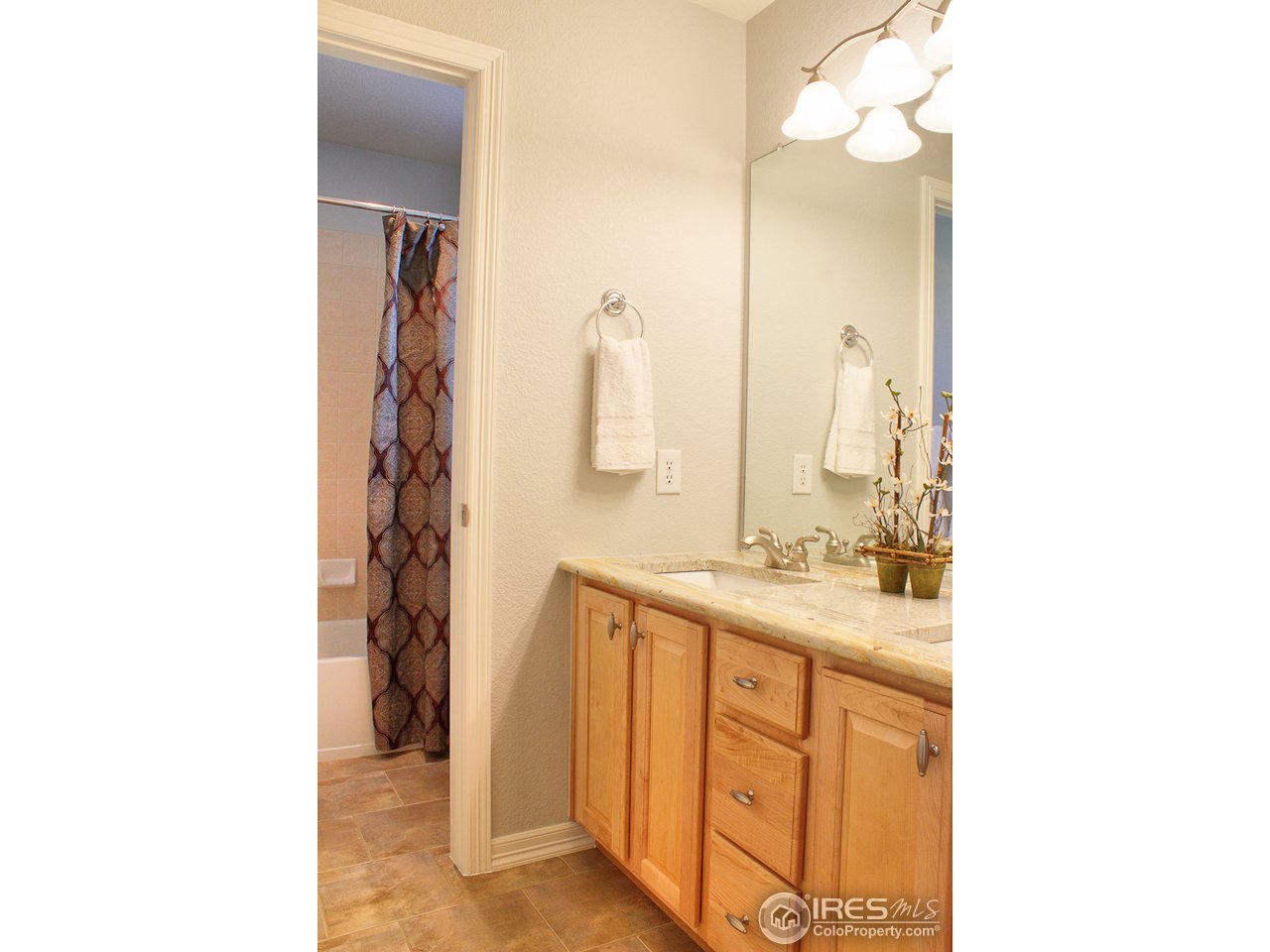4393 Rabbit Mountain Road Broomfield, CO 80020 - Photo 16 of 23 Secondary bath with imported slab granite counters