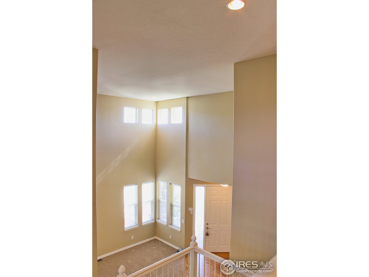 4393 Rabbit Mountain Road Broomfield, CO 80020 - Photo 21 of 23 look through the entire home from the upstairs