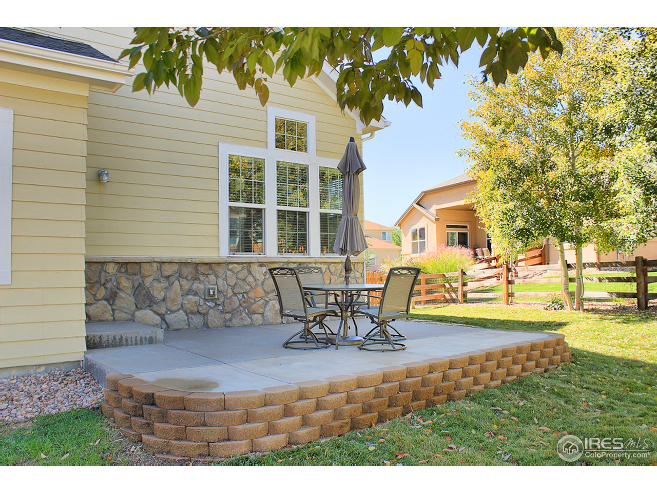 4393 Rabbit Mountain Road Broomfield, CO 80020 - Photo 23 of 23 Large play area with play set and spacious patio