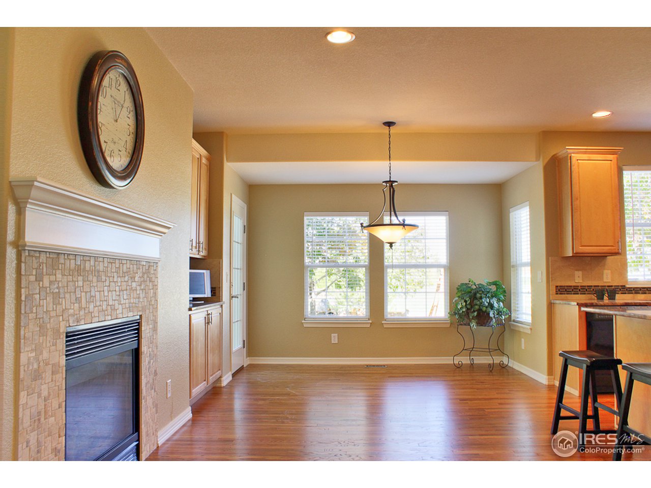4393 Rabbit Mountain Road Broomfield, CO 80020 - Photo 6 of 23 Large eain area with solid Oak floors