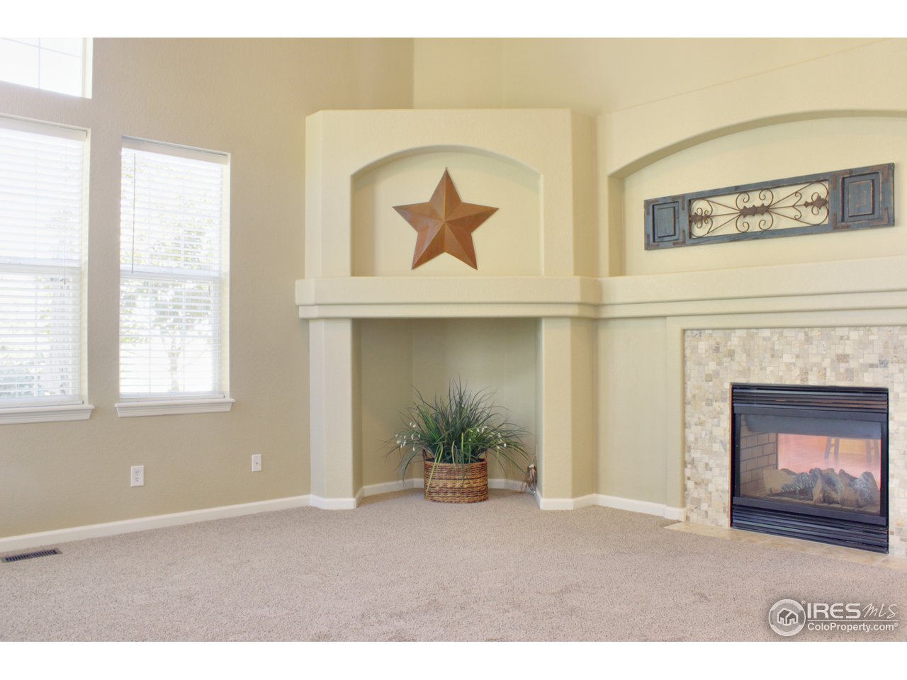 4393 Rabbit Mountain Road Broomfield, CO 80020 - Photo 9 of 23 Family room with built-in entertainment center