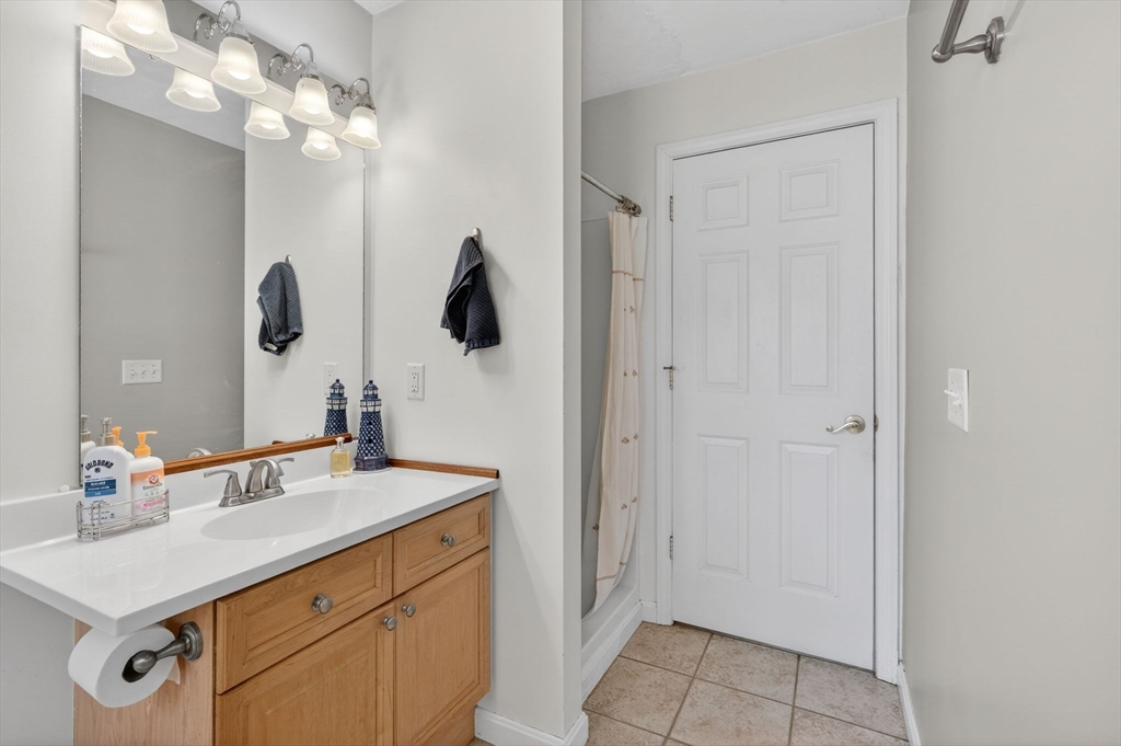 155 Brook Street Hudson, MA 01749 - Photo 15 of 42 a bathroom with a sink vanity and mirror