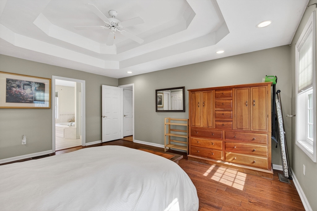 155 Brook Street Hudson, MA 01749 - Photo 18 of 42 a bedroom with a bed and a dresser