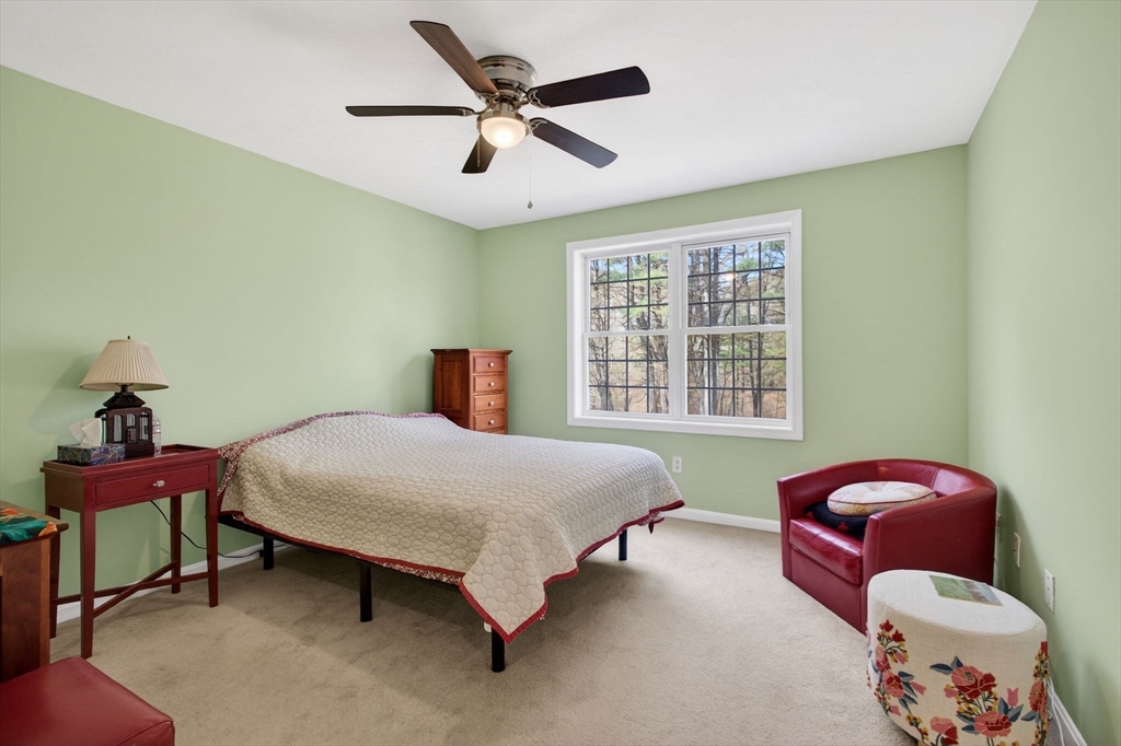 155 Brook Street Hudson, MA 01749 - Photo 22 of 42 a bedroom with a bed and a window