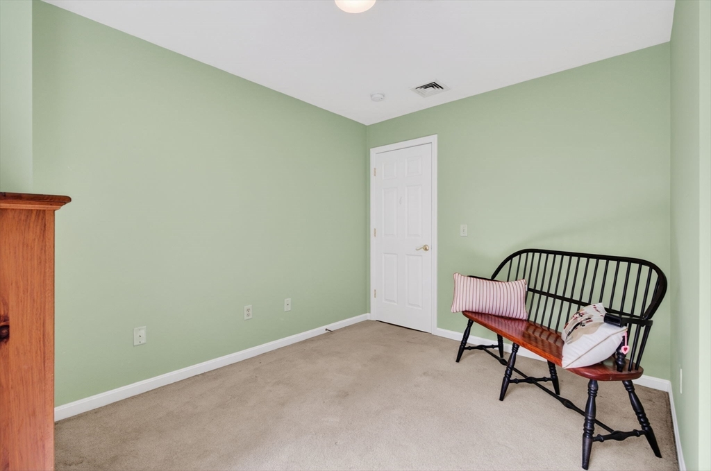 155 Brook Street Hudson, MA 01749 - Photo 27 of 42 a view of a room with furniture and a window