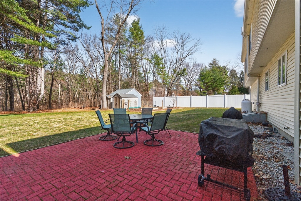 155 Brook Street Hudson, MA 01749 - Photo 33 of 42 a view of a yard with furniture and a backyard