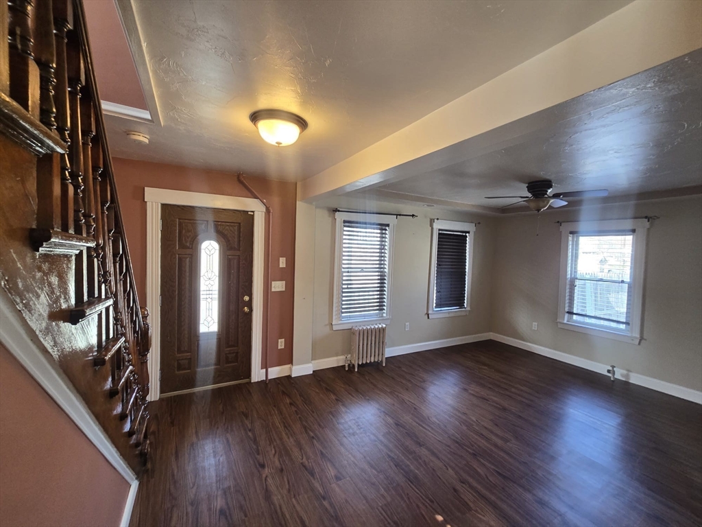 14 Chestnut Avenue, Unit 2 Auburn, MA 01501 - Photo 2 of 41 wooden floor in an empty room with a window