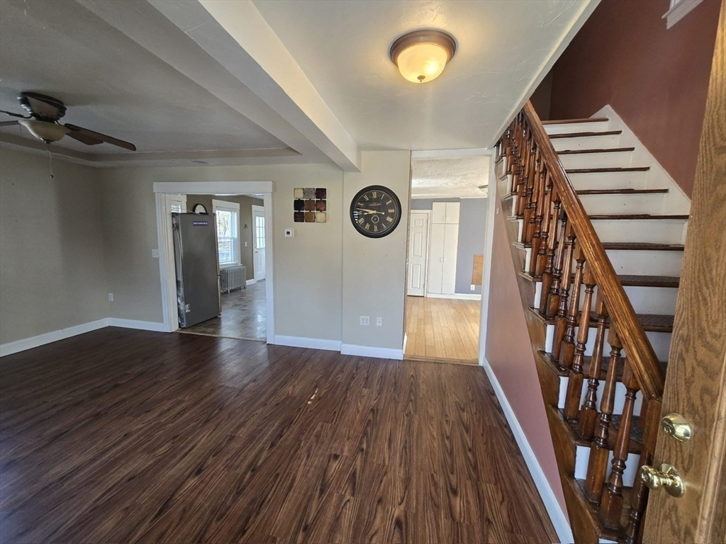 14 Chestnut Avenue, Unit 2 Auburn, MA 01501 - Photo 3 of 41 a view of a hallway with wooden floor