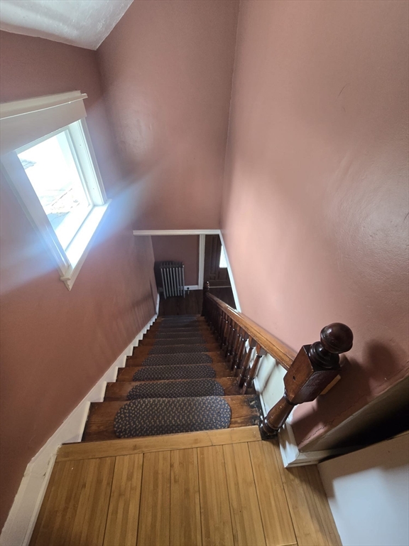 14 Chestnut Avenue, Unit 2 Auburn, MA 01501 - Photo 40 of 41 a view of entryway and hall with wooden floor