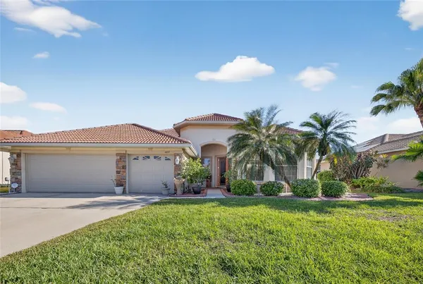 a front view of house with yard and entertaining space