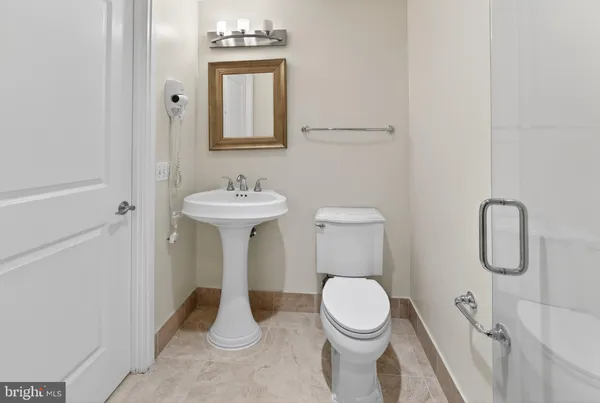 a kitchen with wooden floor and a stove top oven