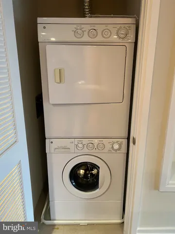 a view of a room with a table and chair