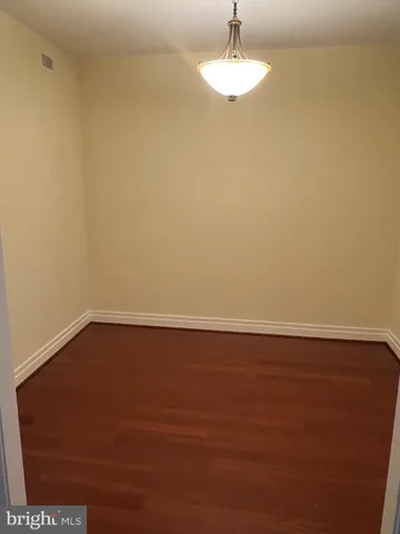 a bathroom with a shower and a toilet