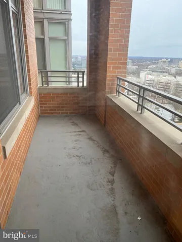 a view of a patio with a fountain