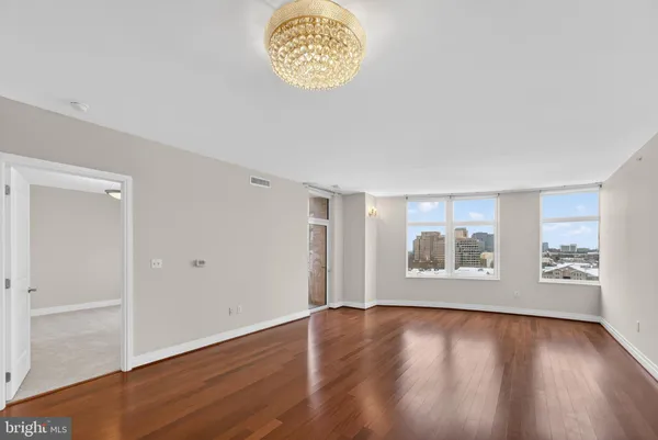 a bathroom with a granite countertop sink a toilet and bathtub