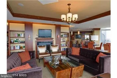 a room with wooden furniture table and chairs