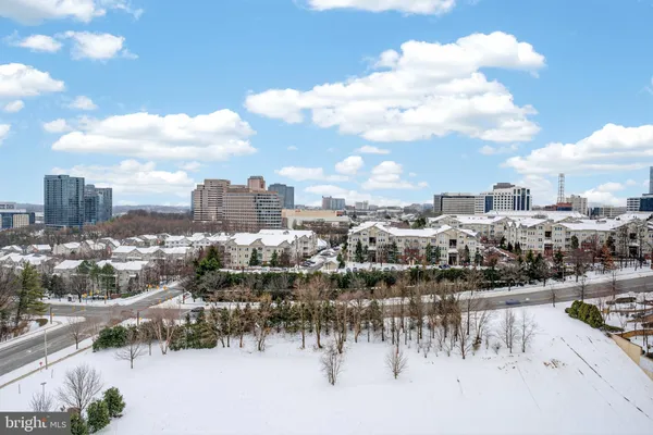 a front view of building with yard