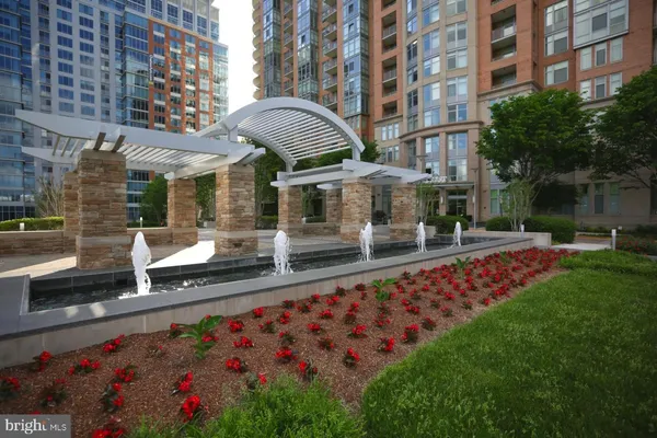 a room with wooden furniture table and chairs