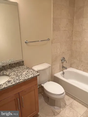 a bathroom with a sink and a shower