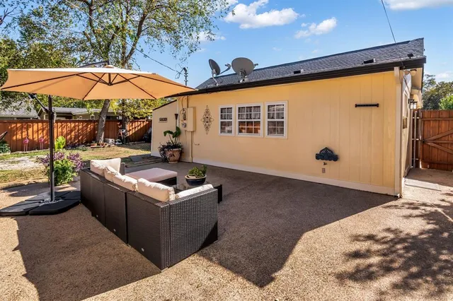 a view of a swimming pool with a patio