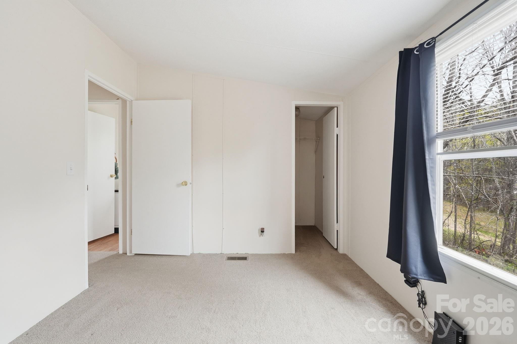 2862 Eagle Point Drive Trinity, NC 27370 - Photo 21 of 31 a view of an empty room with a window