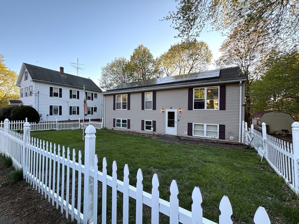 47 Grove Street Spencer, MA 01562 - Photo 2 of 27 a front view of house with yard and green space
