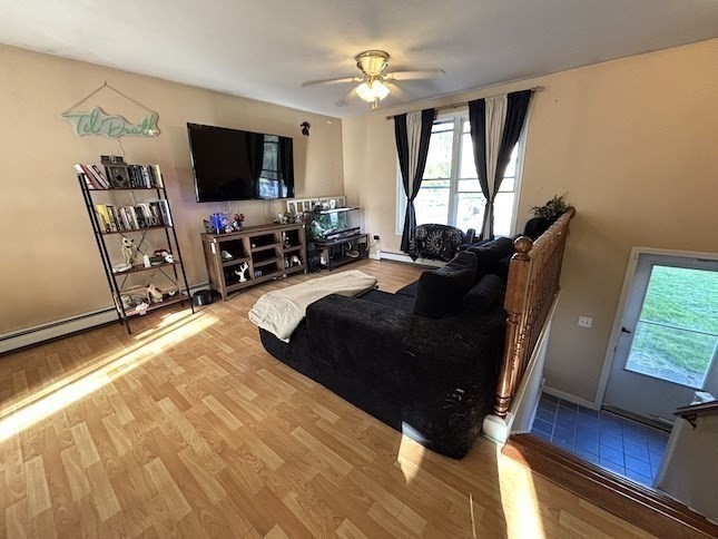 47 Grove Street Spencer, MA 01562 - Photo 3 of 27 a living room with furniture and a flat screen tv