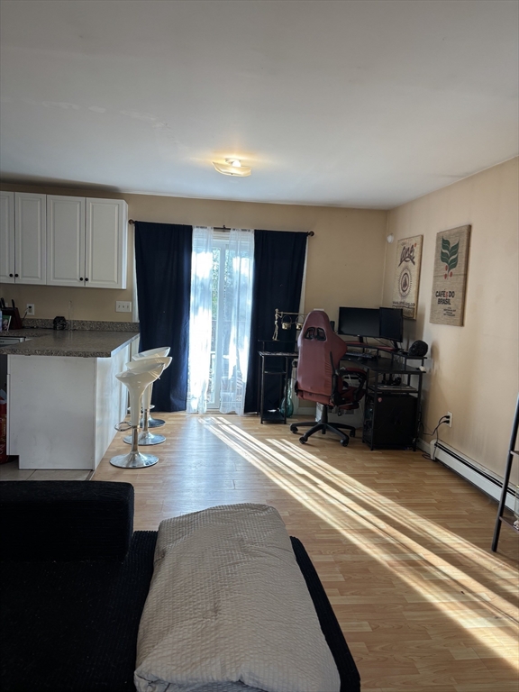 47 Grove Street Spencer, MA 01562 - Photo 5 of 27 a living room with furniture and a wooden floor