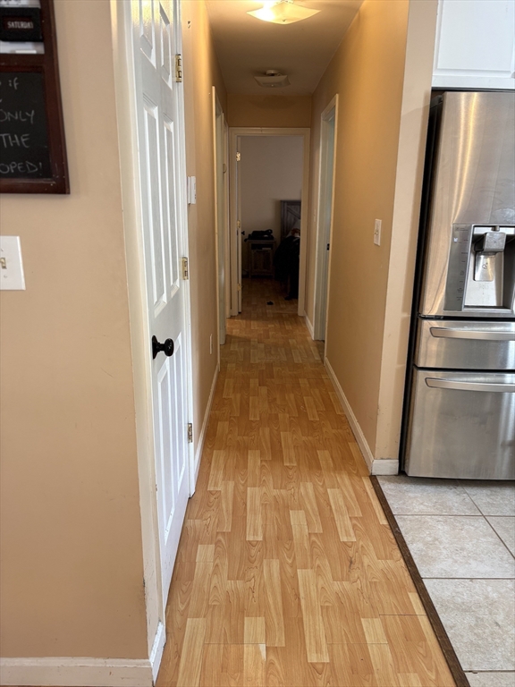 47 Grove Street Spencer, MA 01562 - Photo 6 of 27 a view of a hallway from a hallway