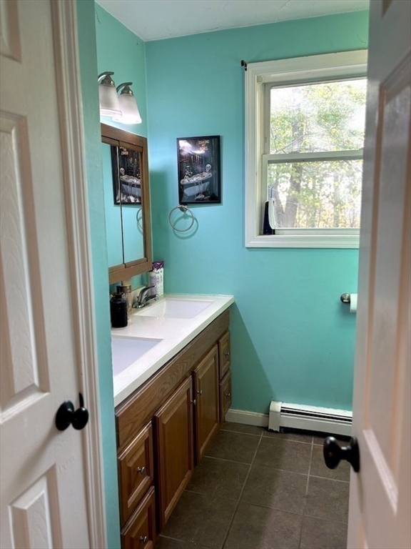 47 Grove Street Spencer, MA 01562 - Photo 7 of 27 a room with window washer and dryer