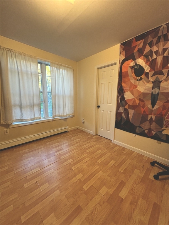 47 Grove Street Spencer, MA 01562 - Photo 10 of 27 a view of an empty room with a window