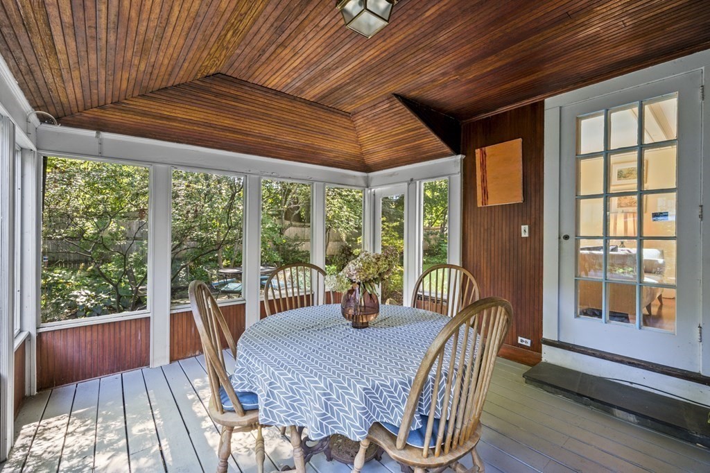 154 Mill Street Newton, MA 02459 - Photo 13 of 15 a view of a dining room with furniture window and outside view